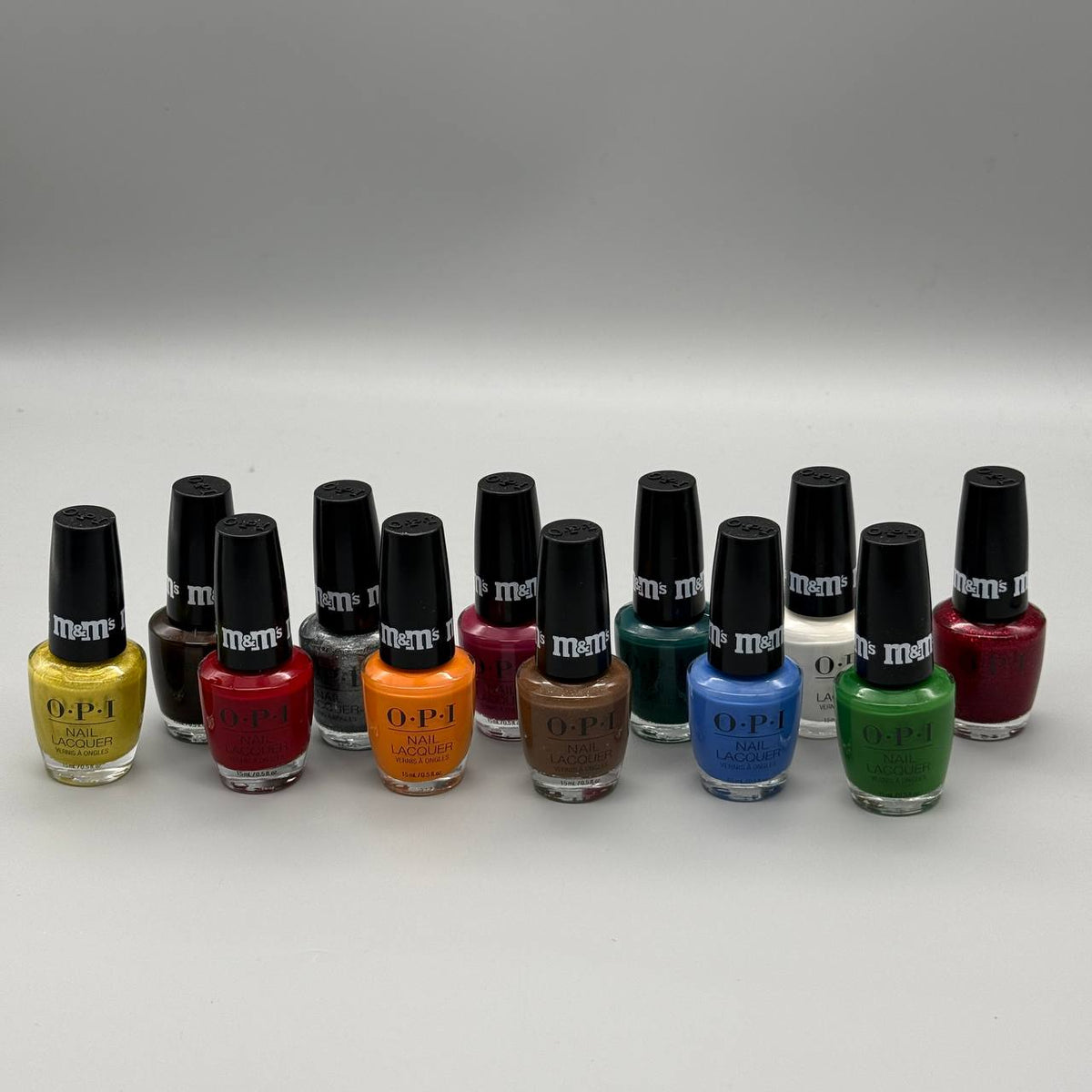 OPI Nail Lacquer Sweeten Your Mani x M&M’s Holiday 2026, 12-Piece Display - NAIL LACQUER OR REGULAR
